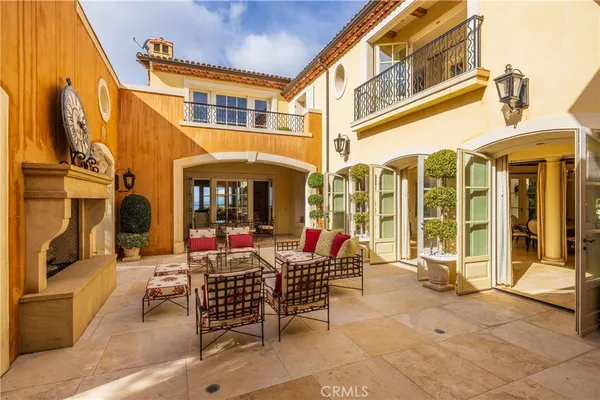 a view of balcony with furniture