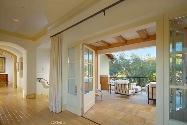 a view of a house with backyard sitting area and garden