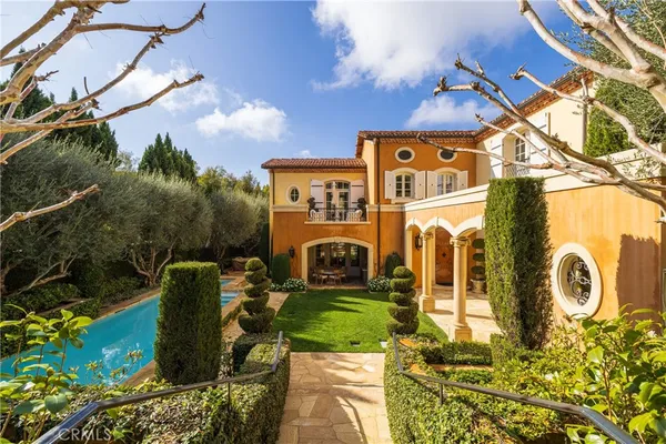 a view of a back yard of the house