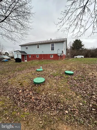 a view of a yard with an outdoor space