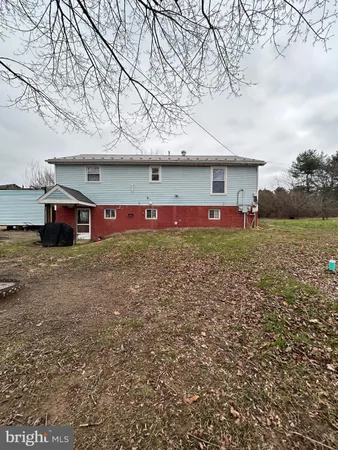 a front view of house with yard