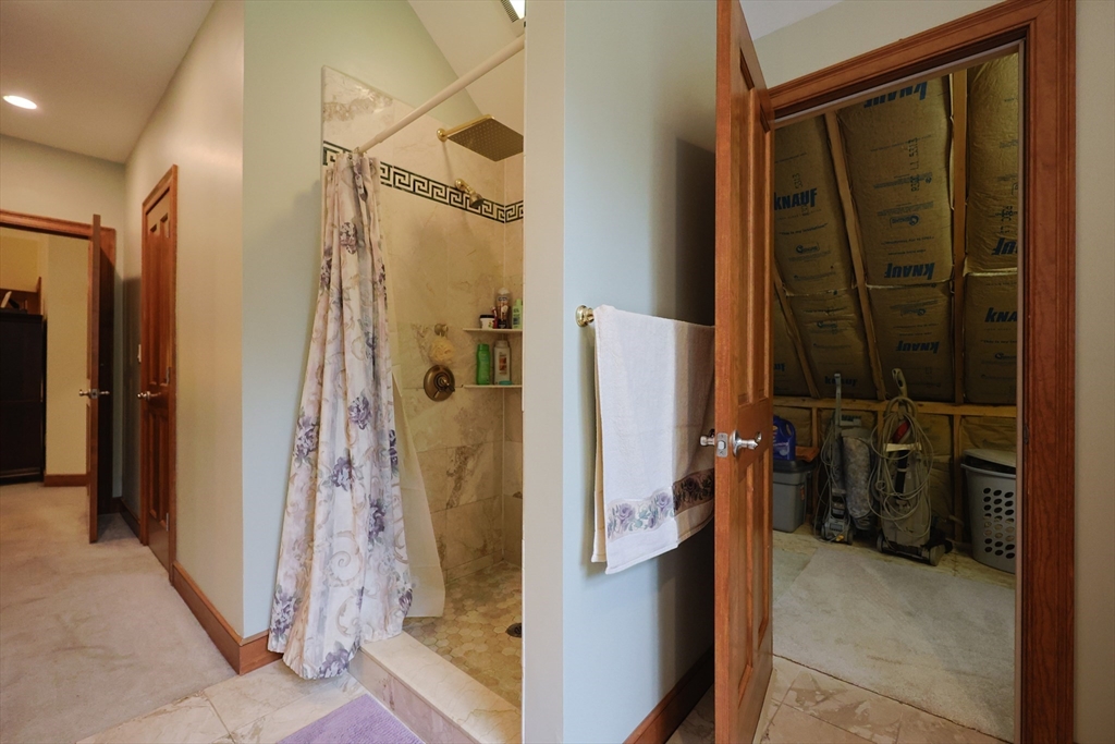 70 Azalea Way Hanson, MA 02341 - Photo 30 of 42 a bathroom with a shower and a mirror