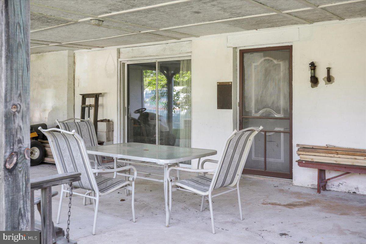 329 Gates Road Hershey, PA 17033 - Photo 7 of 34 Covered rear Patio at walk out basement