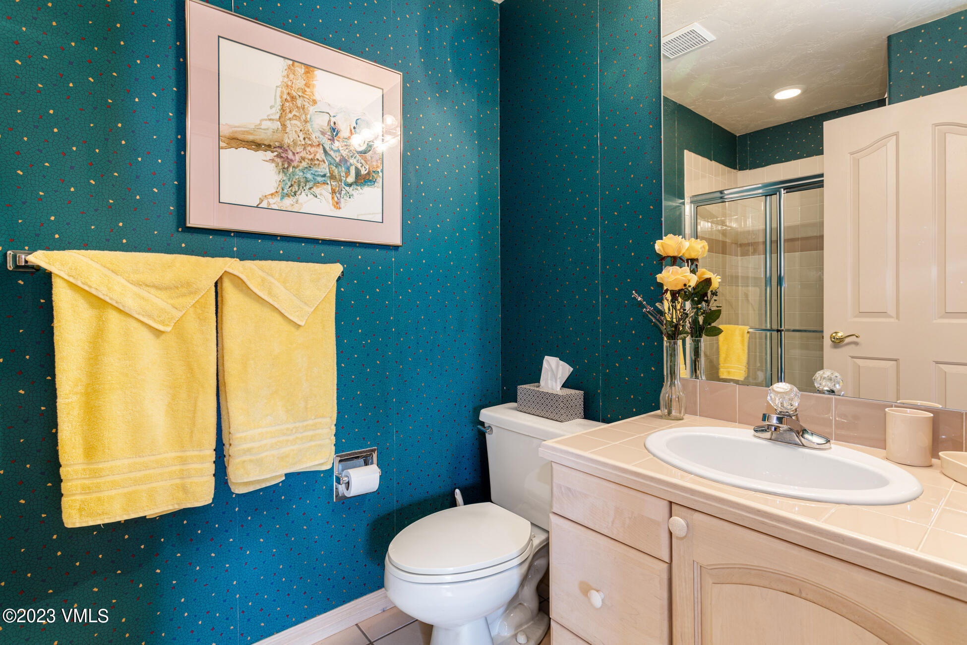751 Singletree Road, Unit 1 Edwards, CO 81632 - Photo 13 of 16 a bathroom with a toilet sink and mirror