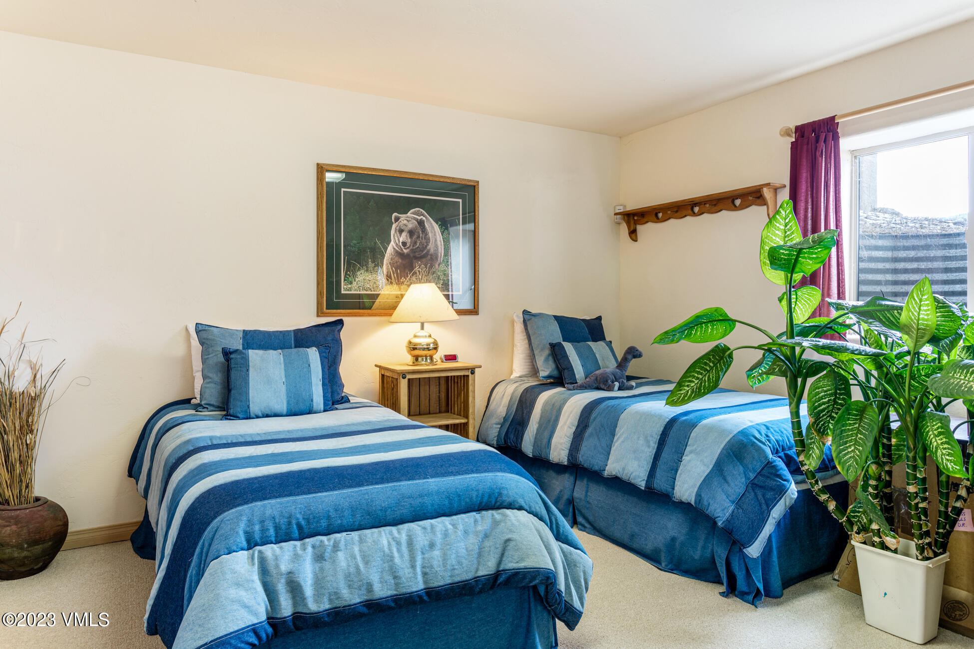 751 Singletree Road, Unit 1 Edwards, CO 81632 - Photo 14 of 16 a bedroom with bed and a potted plant