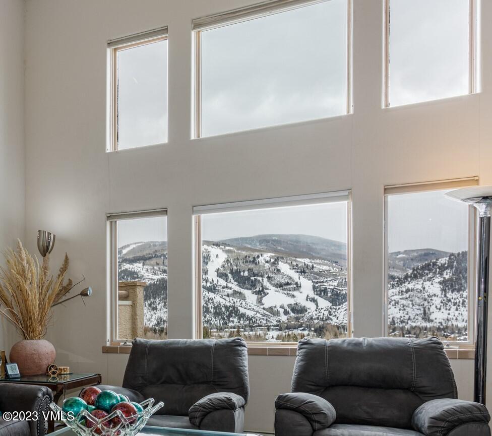 751 Singletree Road, Unit 1 Edwards, CO 81632 - Photo 3 of 16 a living room with furniture and a large window