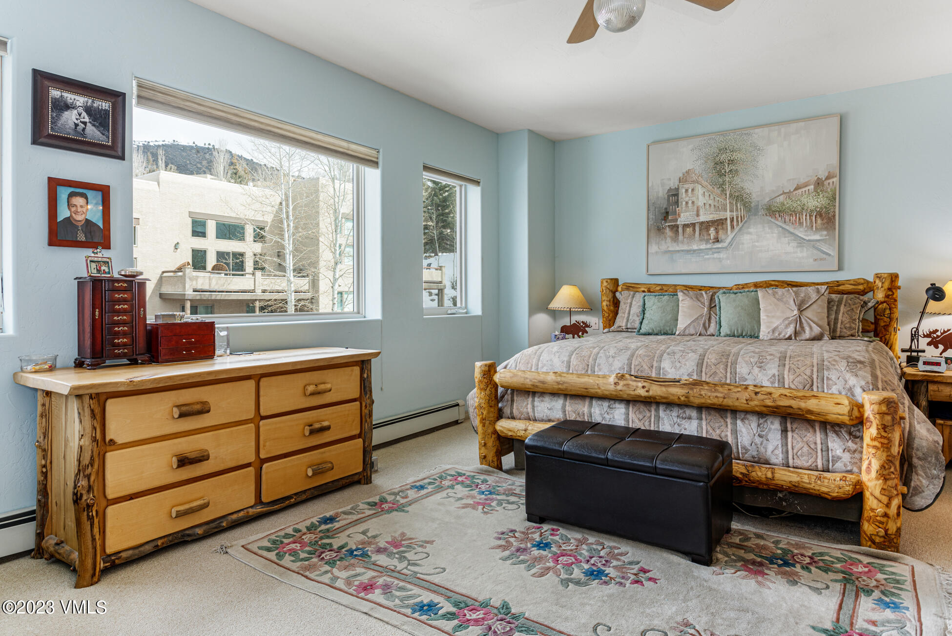 751 Singletree Road, Unit 1 Edwards, CO 81632 - Photo 8 of 16 a bedroom with a bed and wooden floor