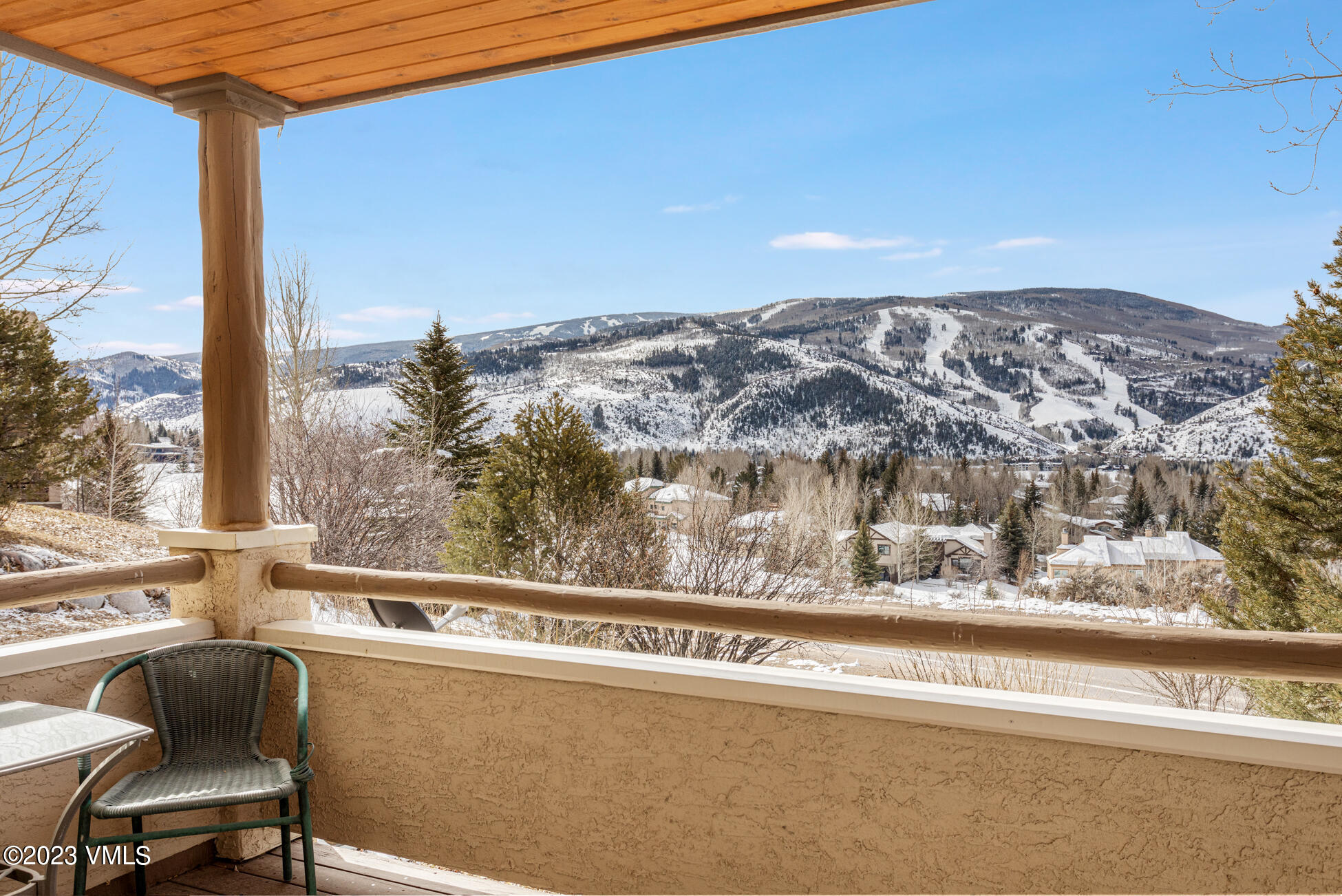 751 Singletree Road, Unit 1 Edwards, CO 81632 - Photo 9 of 16 a view of a balcony with furniture and a floor to ceiling window