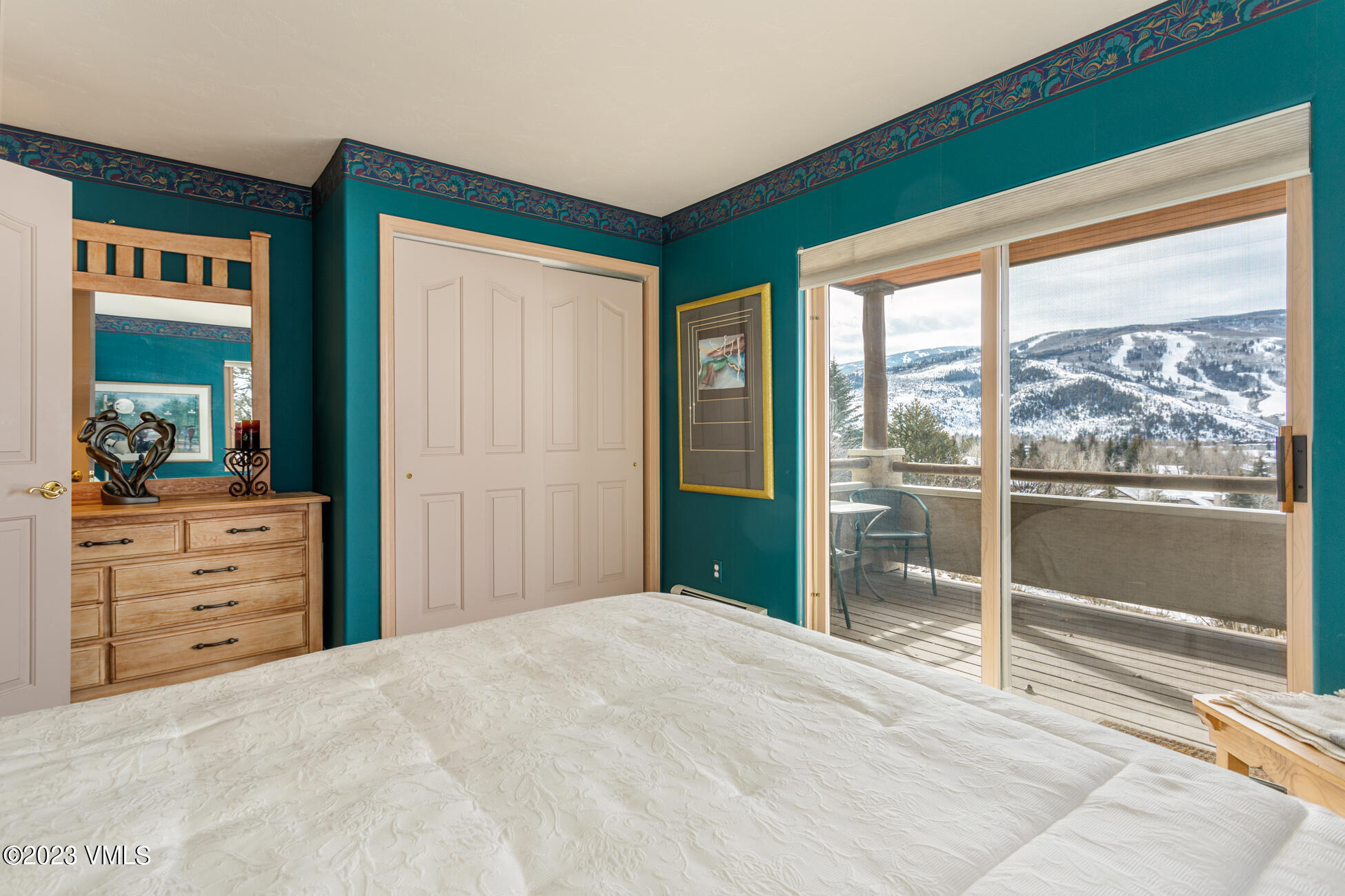 751 Singletree Road, Unit 1 Edwards, CO 81632 - Photo 10 of 16 a bedroom with a bed and a large window