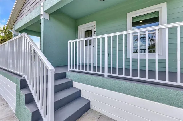a kitchen with stainless steel appliances granite countertop a stove sink and refrigerator