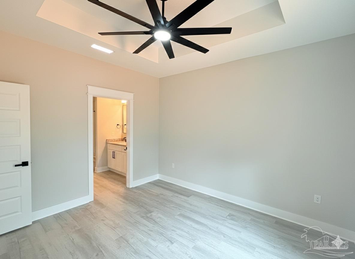 2936 North 14th Avenue Milton, FL 32583 - Photo 10 of 23 wooden floor in an empty room