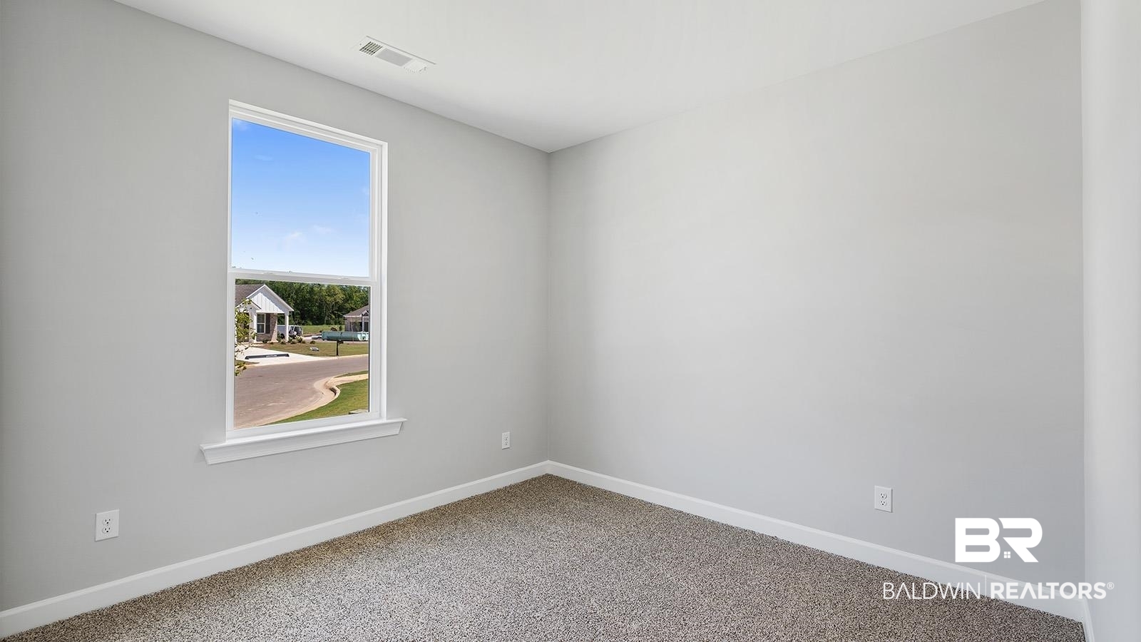 30567 Asheville Road Daphne, AL 36527 - Photo 26 of 29 Empty room featuring baseboards and carpet