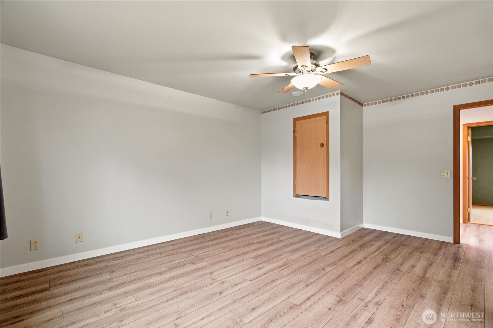 2401 185th Place Southeast Bothell, WA 98012 - Photo 34 of 36 a view of empty room with wooden floor