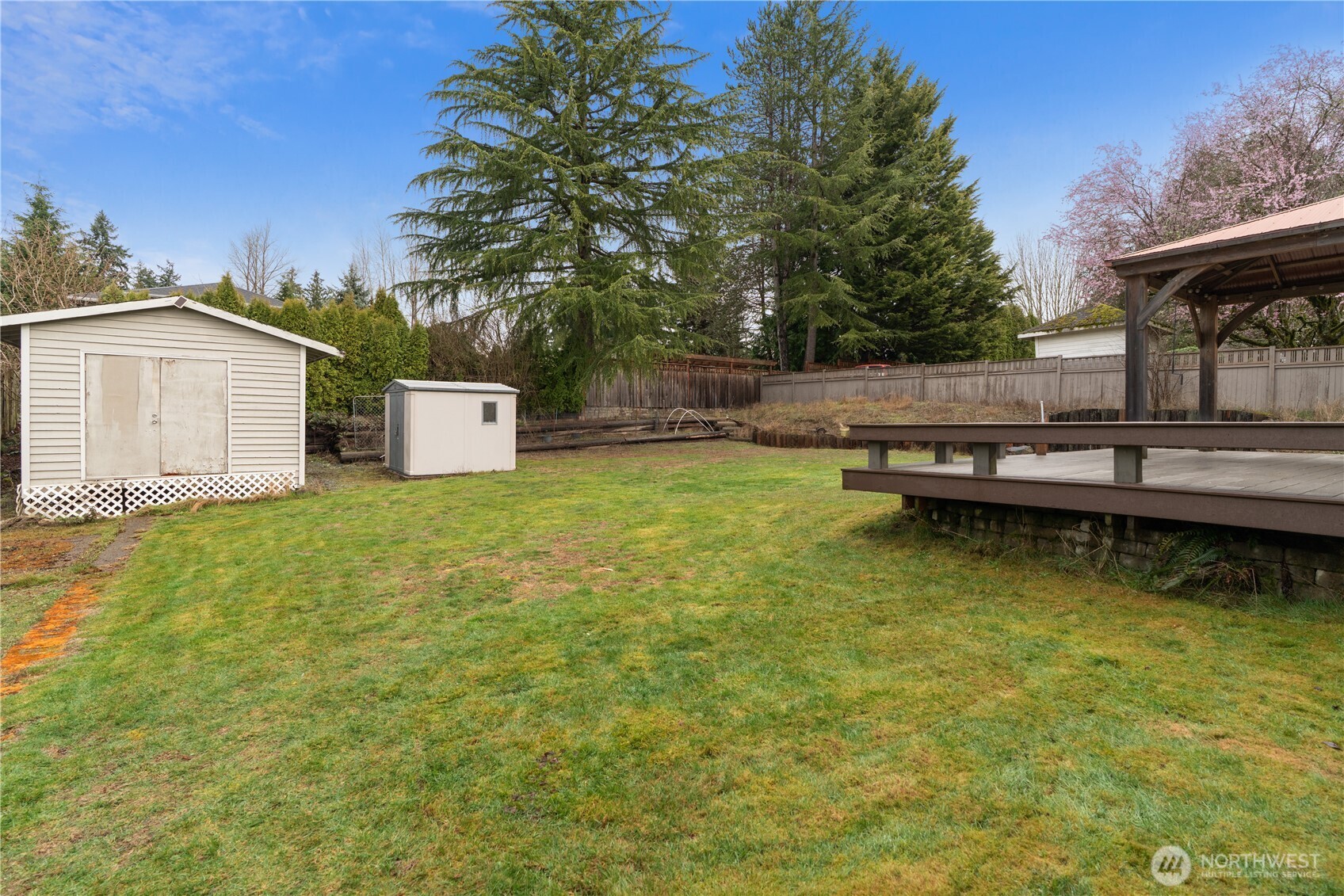 2401 185th Place Southeast Bothell, WA 98012 - Photo 4 of 36 a view of a house with pool and chairs