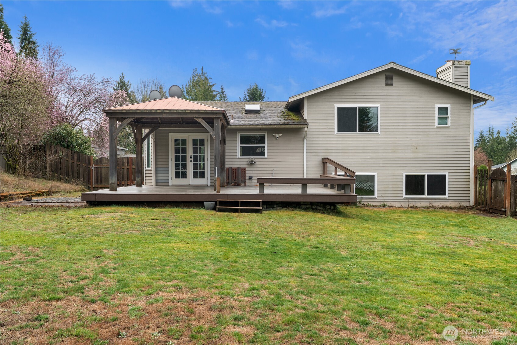 2401 185th Place Southeast Bothell, WA 98012 - Photo 5 of 36 a view of a house with pool and chairs