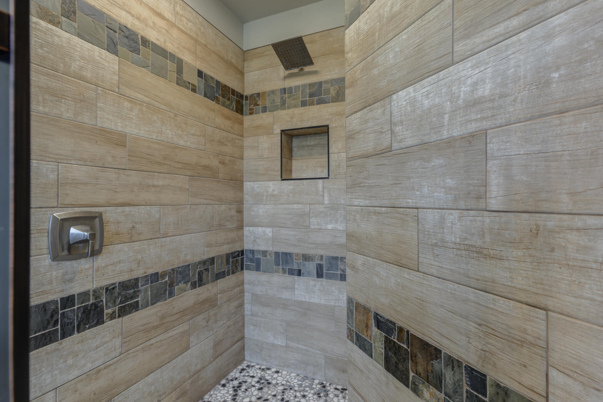 4921 10th Street Lubbock, TX 79416 - Photo 19 of 29 a bathroom with a shower