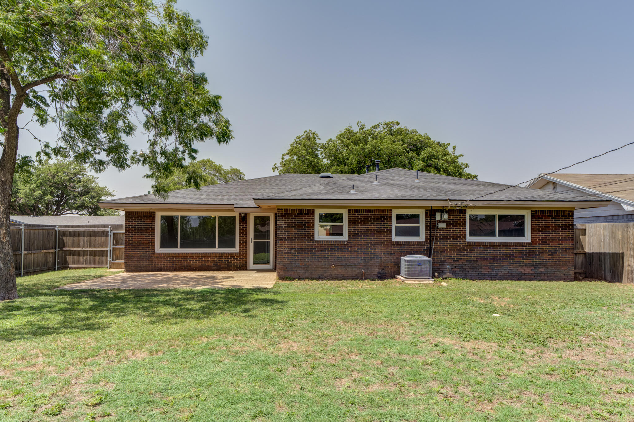 4921 10th Street Lubbock, TX 79416 - Photo 28 of 29 a view of a house with a yard