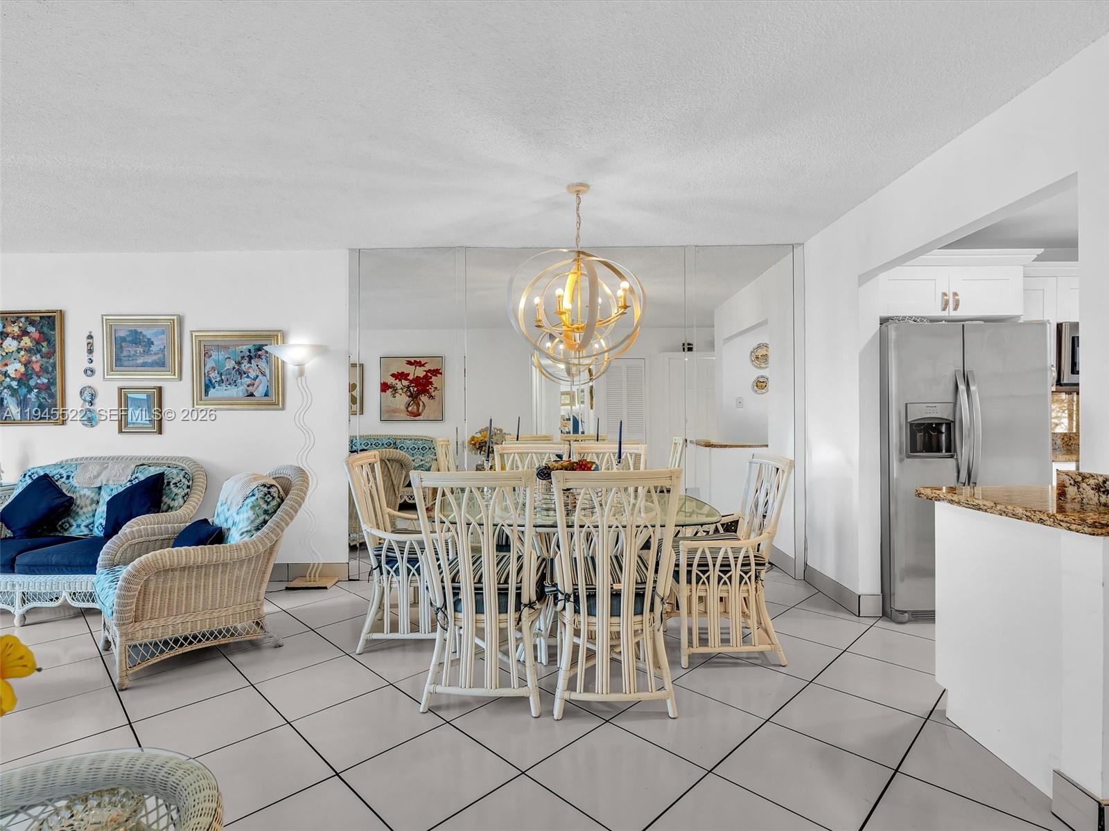 1750 West 46th Street, Unit 404 Hialeah, FL 33012 - Photo 19 of 42 a view of a dining room with furniture