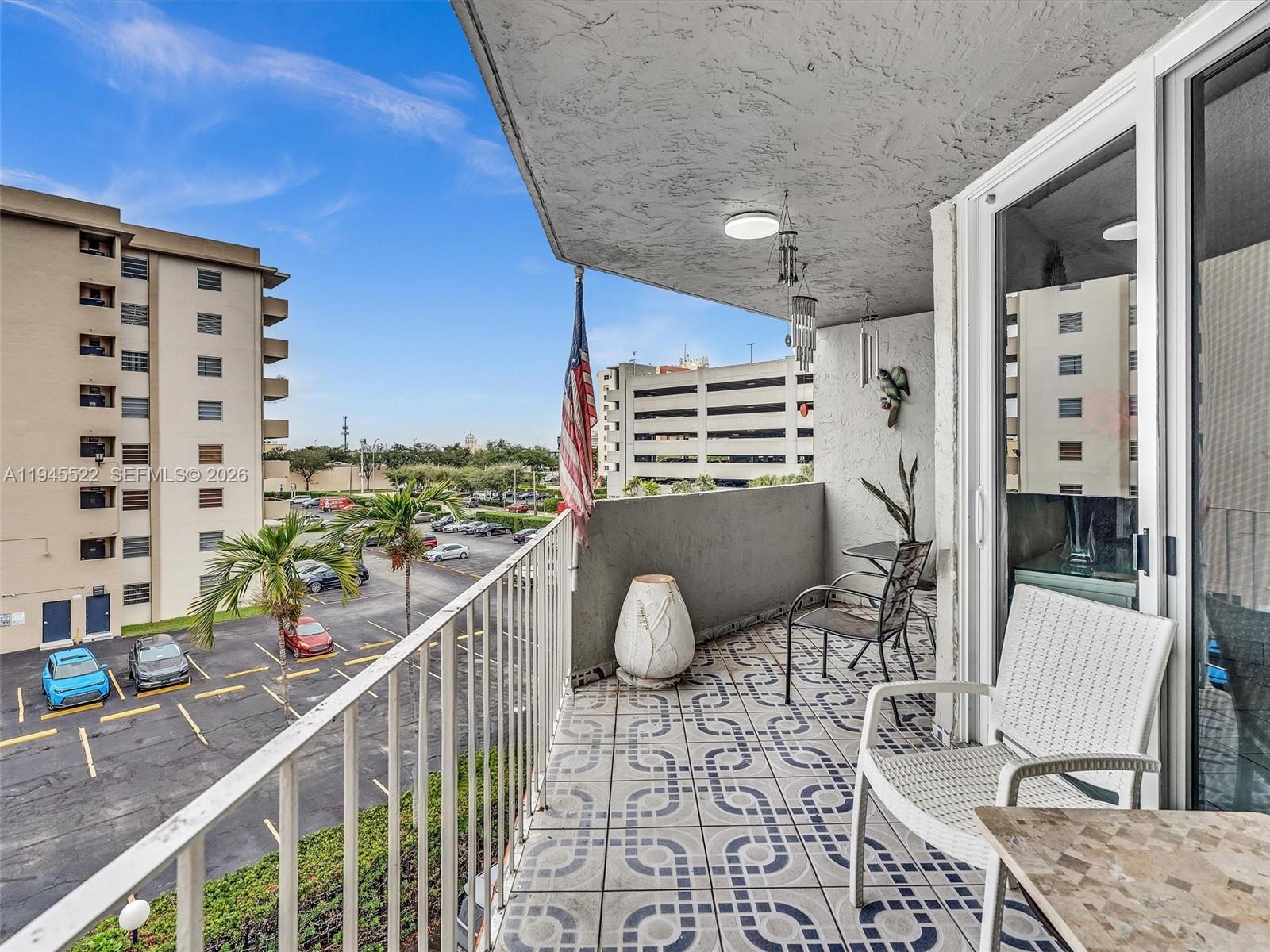 1750 West 46th Street, Unit 404 Hialeah, FL 33012 - Photo 33 of 42 a view of balcony with furniture
