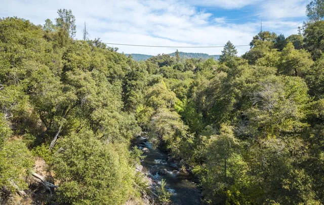 a view of a city with mountains in the background