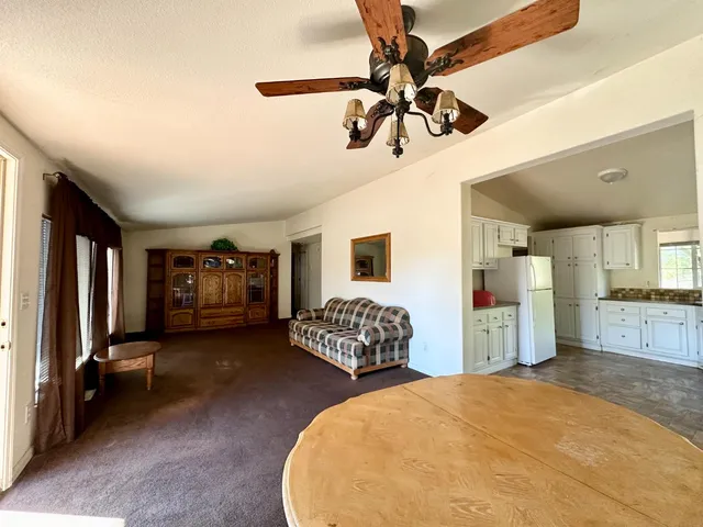 a bedroom with furniture and window