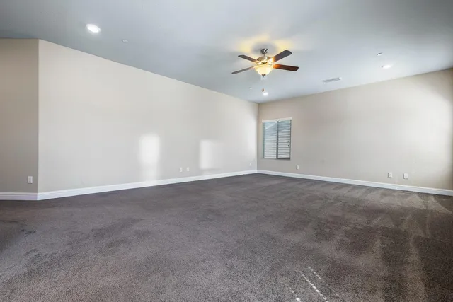 a spacious bathroom with a tub and a shower