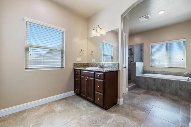 a view of a house with backyard