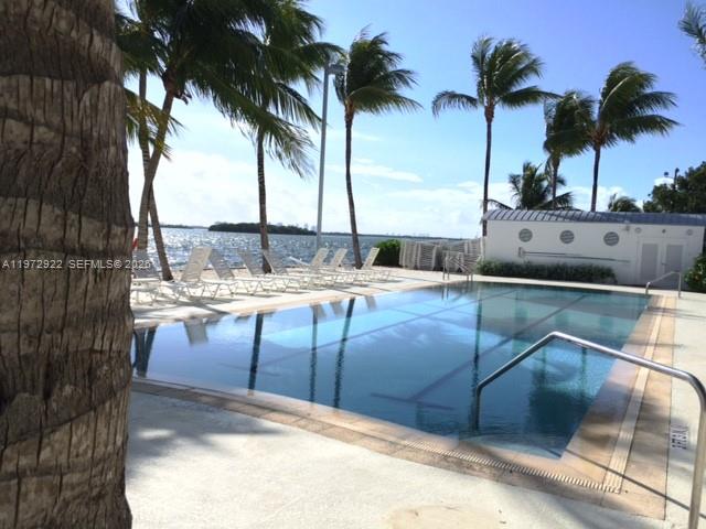 680 Northeast 64th Street, Unit A215 Miami, FL 33138 - Photo 2 of 24 a view of outdoor space with trees