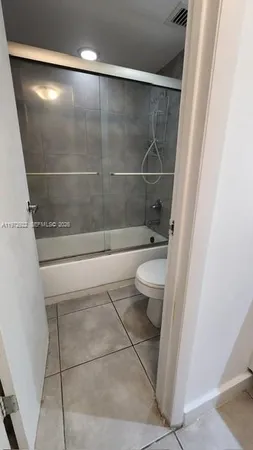 a view of empty room with closet