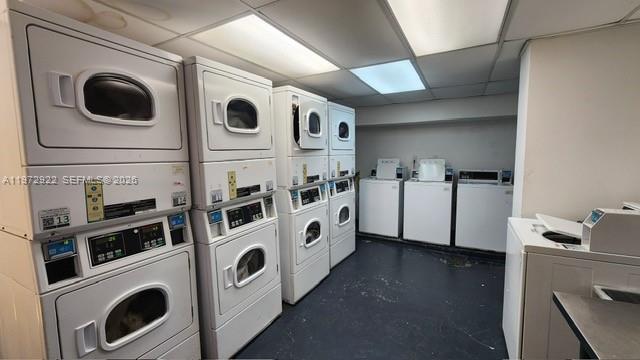 680 Northeast 64th Street, Unit A215 Miami, FL 33138 - Photo 5 of 24 a utility room with dryer and washer
