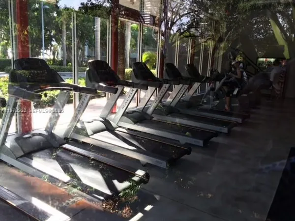 a house view with a sitting space and garden