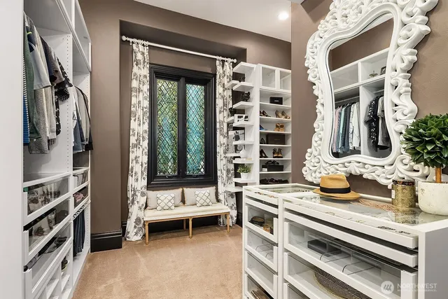 a view of a livingroom with furniture and a window