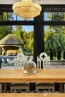 a view of a pool table and chair
