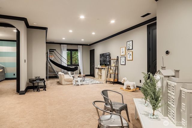 a room with gym equipment and a large mirror