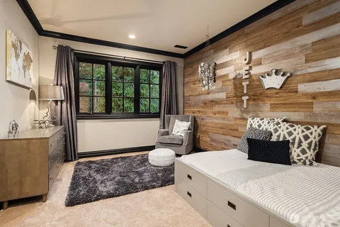 a bathroom with a sink toilet and window