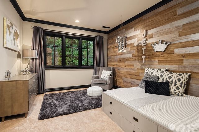 a bathroom with a sink toilet and window