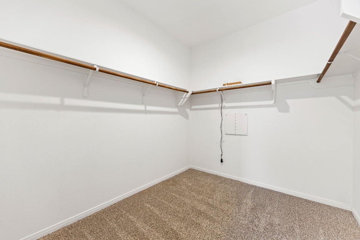 907 Youth Water Road Montgomery, TX 77316 - Photo 13 of 31 a view of a room with racks on the wall