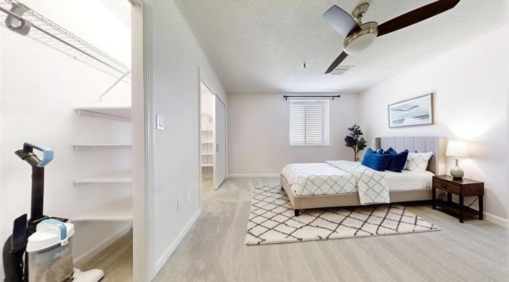 300 Johnson Ferry Road, Unit B805 Sandy Springs, GA 30328 - Photo 2 of 31 a spacious bedroom with a bed and a window