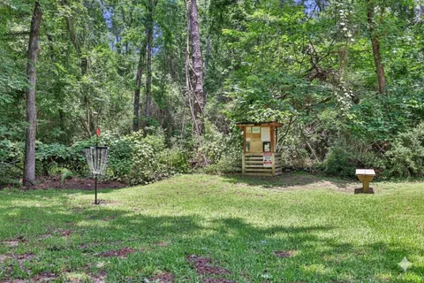 a fire hydrant in the middle of a field