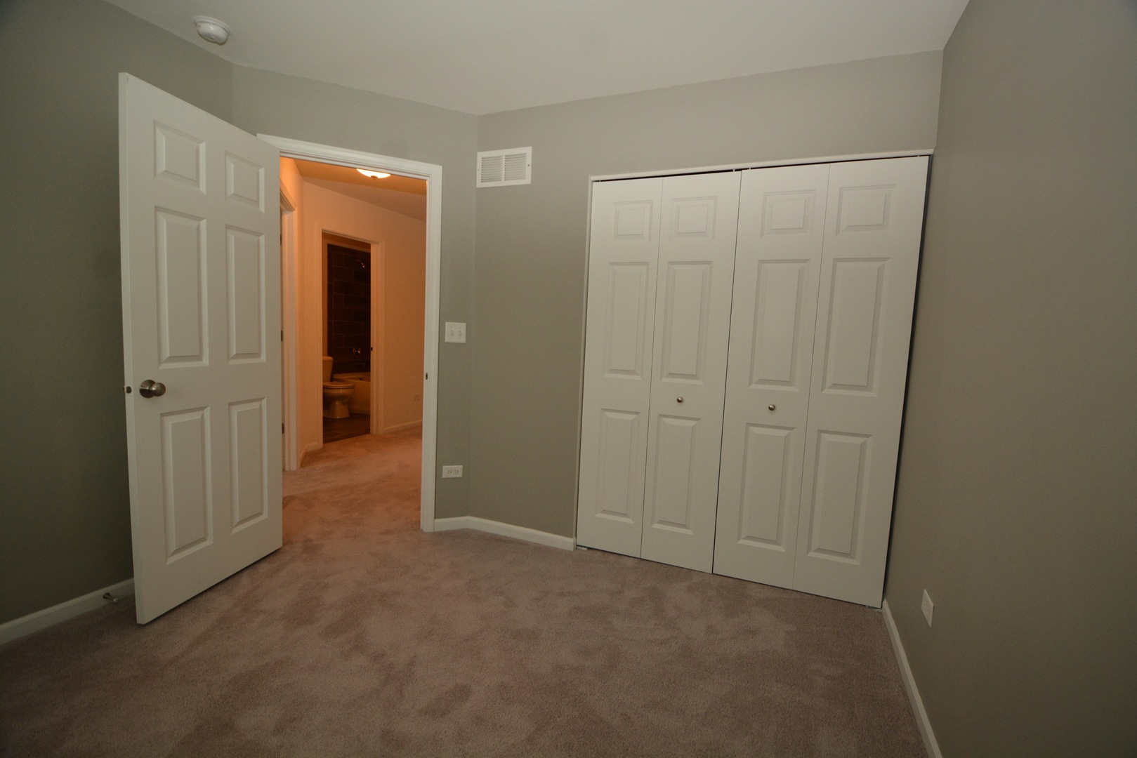 2953 Madison Drive, Unit 2953 Naperville, IL 60564 - Photo 12 of 18 an empty room with closet area