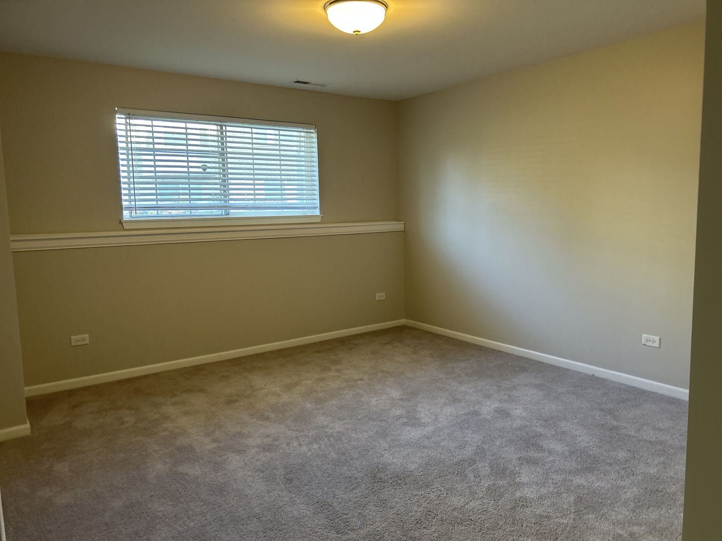 2953 Madison Drive, Unit 2953 Naperville, IL 60564 - Photo 16 of 18 an empty room with a window