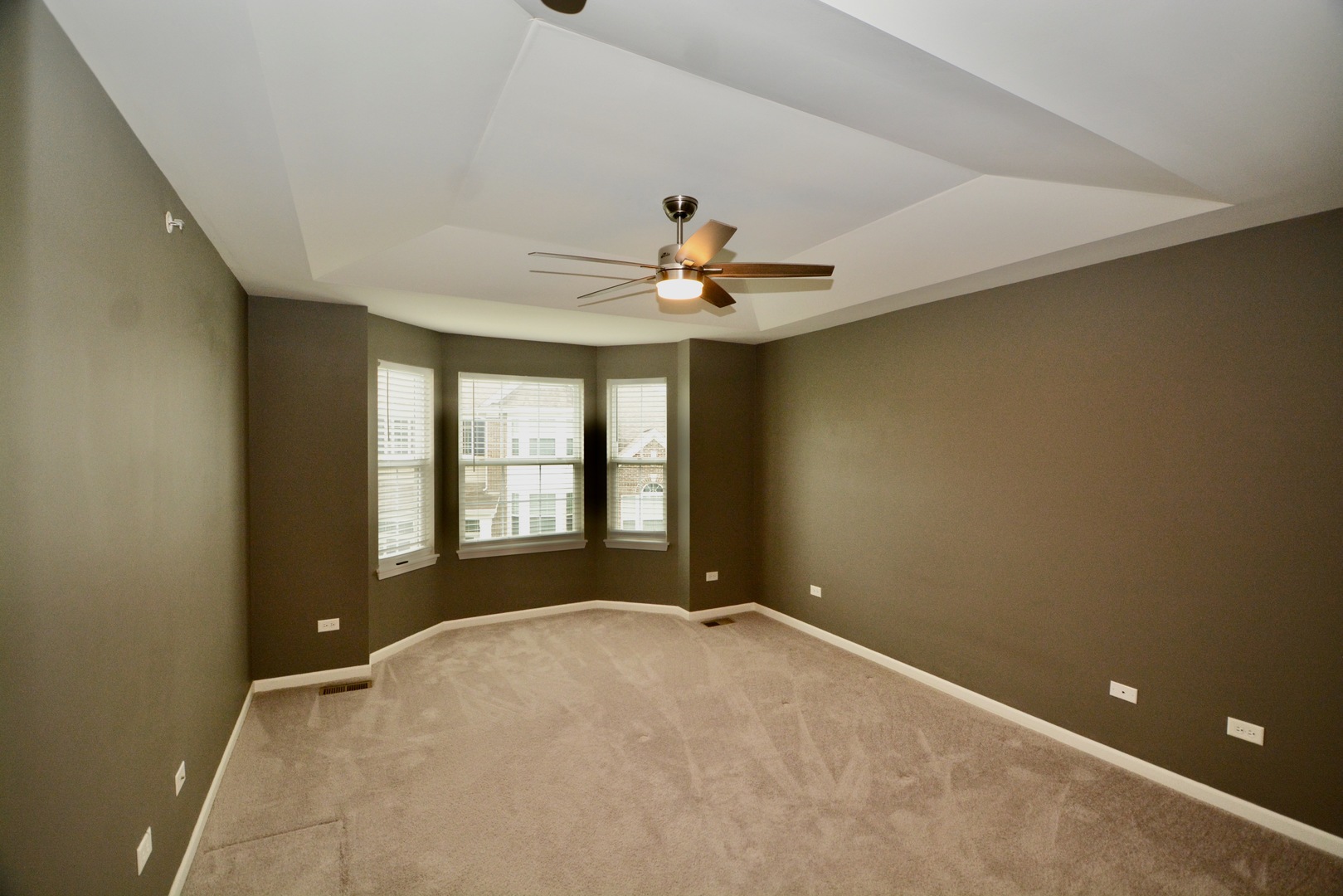 2953 Madison Drive, Unit 2953 Naperville, IL 60564 - Photo 8 of 18 a view of an empty room with a window