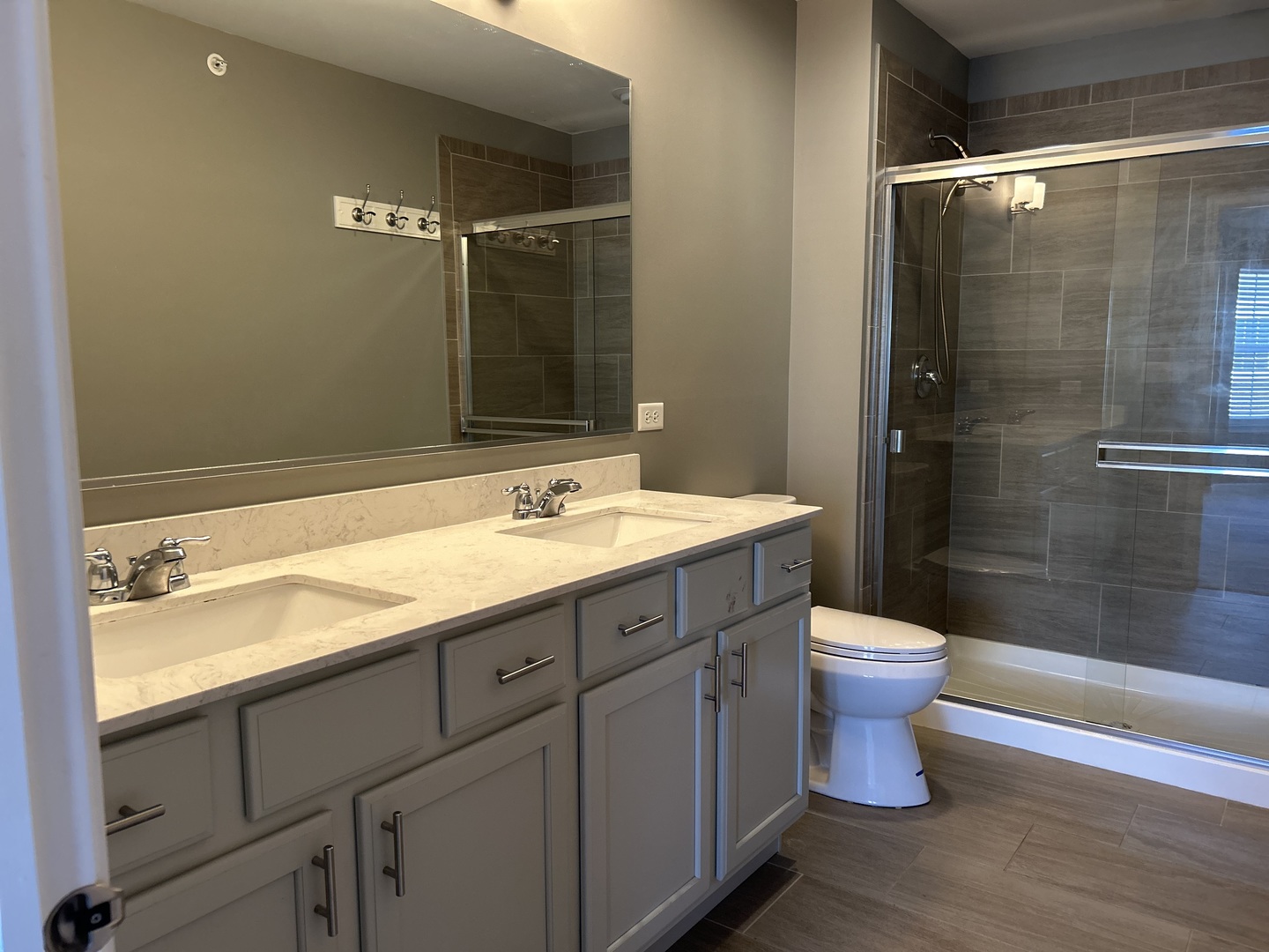 2953 Madison Drive, Unit 2953 Naperville, IL 60564 - Photo 10 of 18 a bathroom with a sink and a mirror