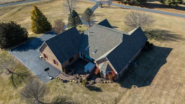 a open kitchen with stainless steel appliances granite countertop a sink stove and refrigerator