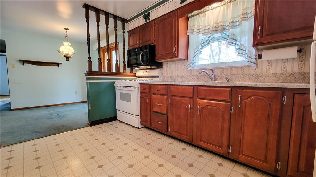 159 Crandon Circle Beaver, PA 15009 - Photo 3 of 13 a kitchen with sink cabinets and window