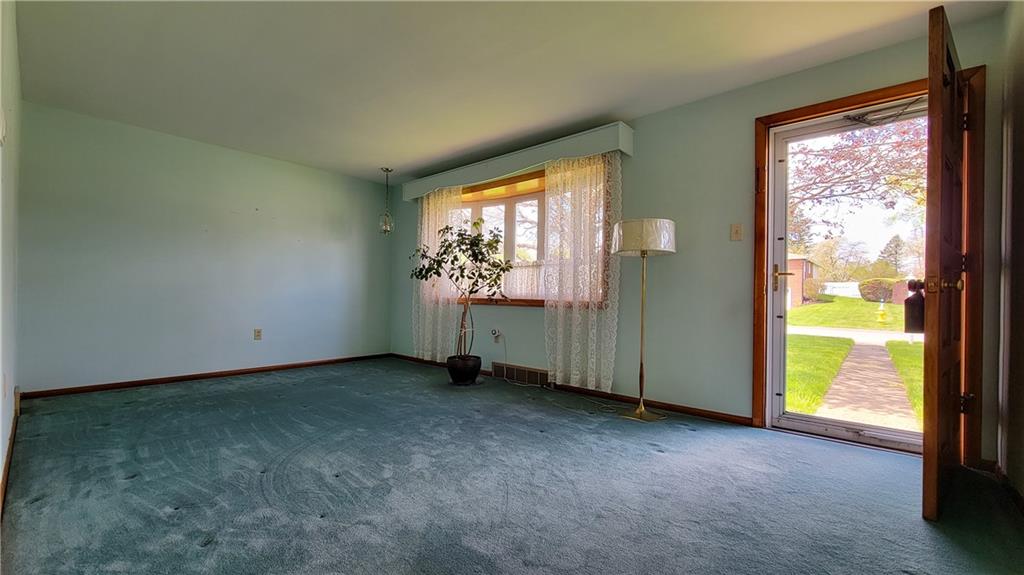 159 Crandon Circle Beaver, PA 15009 - Photo 4 of 13 an empty room with windows