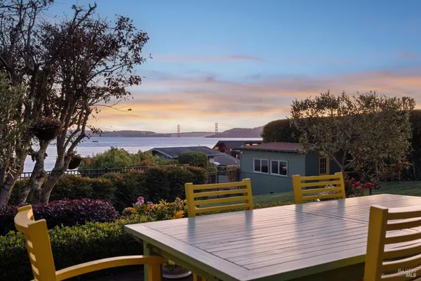 a view of a roof deck with couches