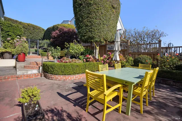 a view of a table and chairs in patio