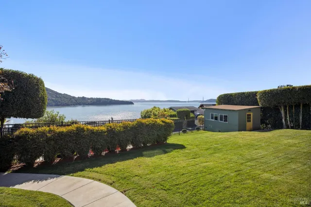 a view of a house with a big yard