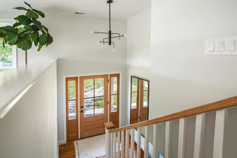 a view of a porch with a potted plant